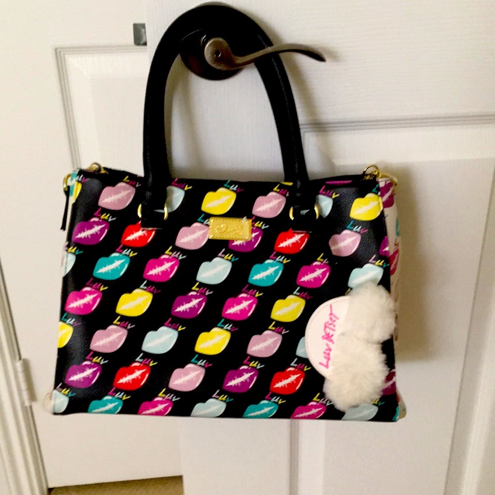 Betsey Johnson handbag with detachable strap.